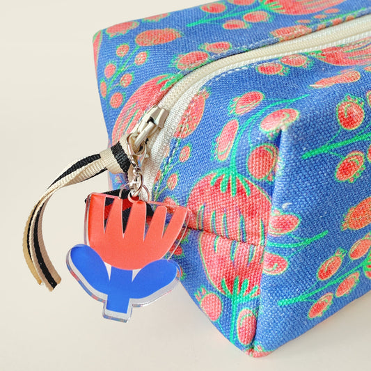 Mapayah CHARMS Flower keychain clipped onto a bag