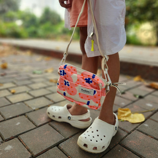 Mapayah SLING Bloom kids cross-body bag styled in a lifestyle setting