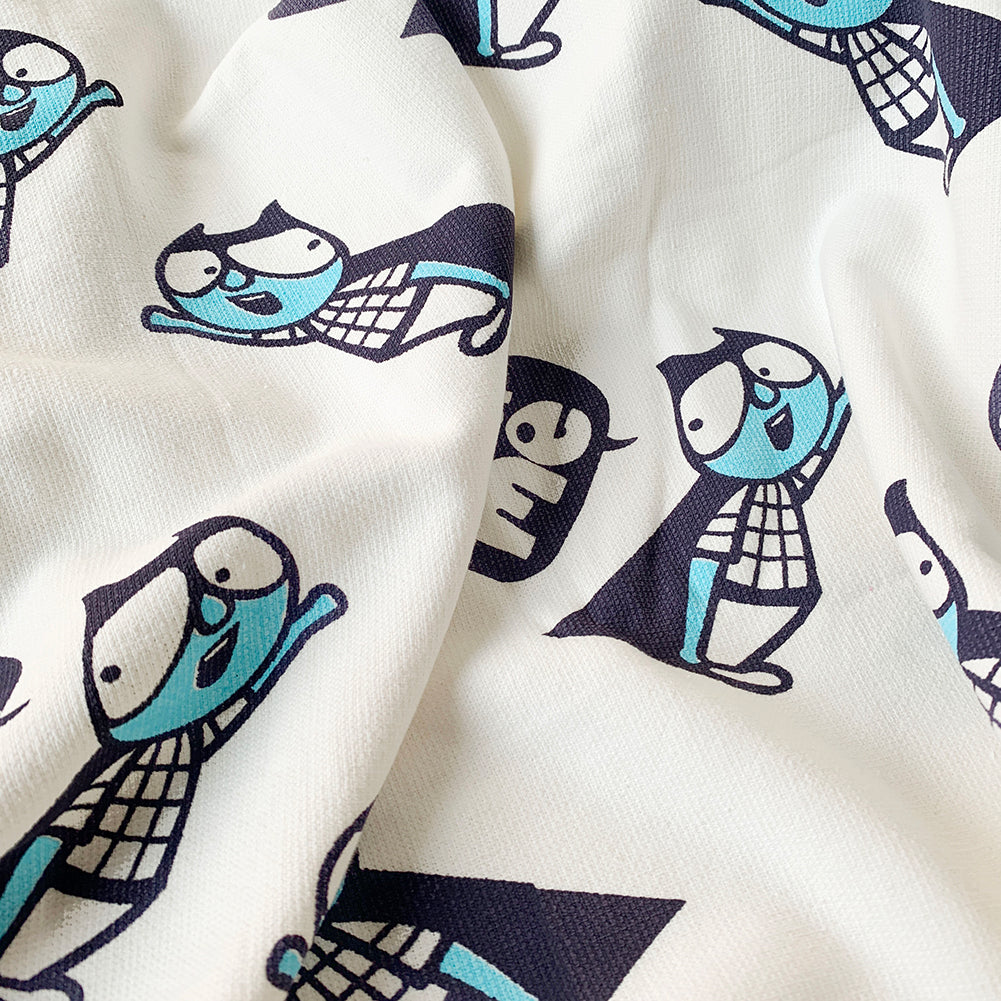 Close-up of superhero print on Mapayah WRAP Super Me kids bath towel