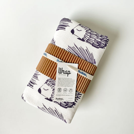 mapayah purple porcupine themed towel neatly packed in a sleeve. perfect for gifting. perfect for adults also