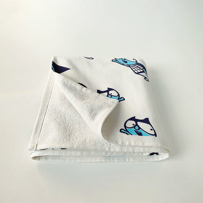Mapayah cotton bath towel featuring a superhero print, neatly folded to show the design, fabric quality, and softness.



