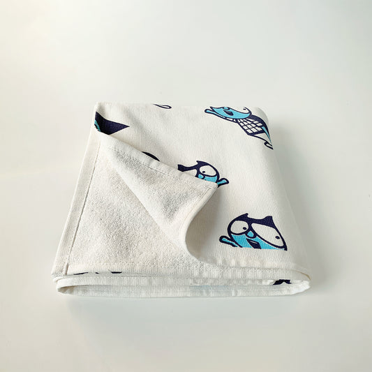 Mapayah cotton bath towel featuring a superhero print, neatly folded to show the design, fabric quality, and softness.




