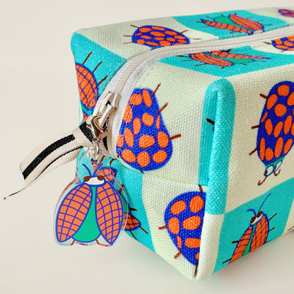 Mapayah CHARMS Ziggy keychain clipped onto a bag