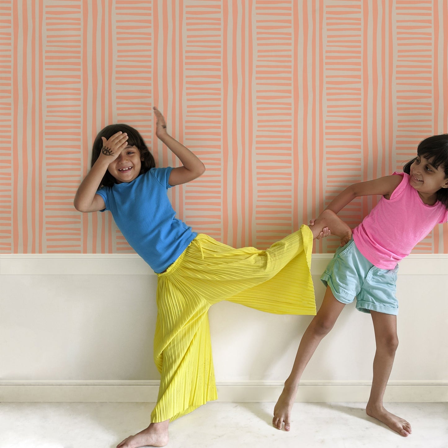 Mapayah DECK Lines kids room wallpaper in orange, styled in a bedroom setting