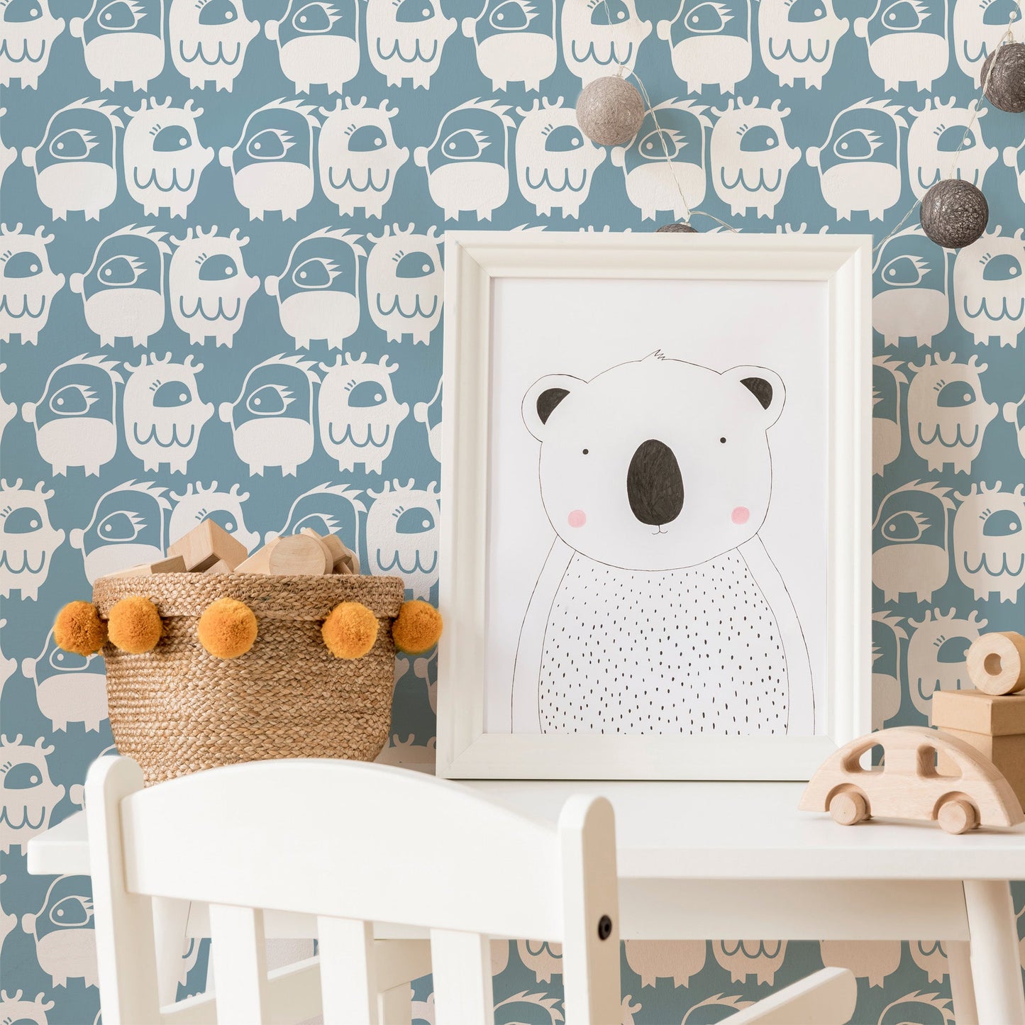 Mapayah DECK Oddlings kids room wallpaper in ocean colorway, styled in a bedroom setting