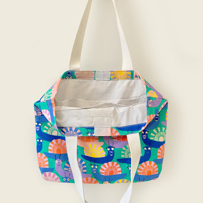 Mapayah FERRY Glo kids tote bag shown open, revealing bottle pouch and lining