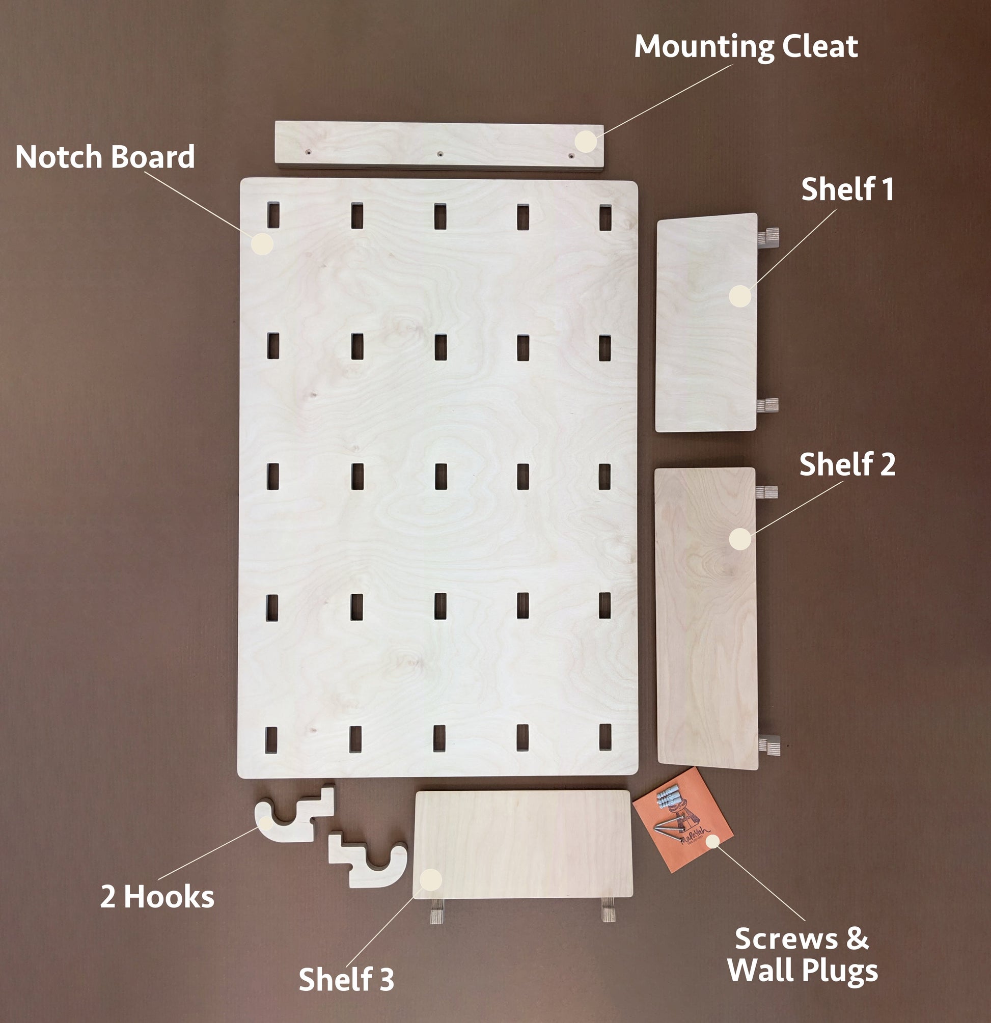Mapayah NOTCH wall shelving system shown with shelves and hooks installed