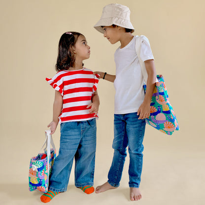 Mapayah PACK Glo kids lunch bag styled in a lifestyle setting