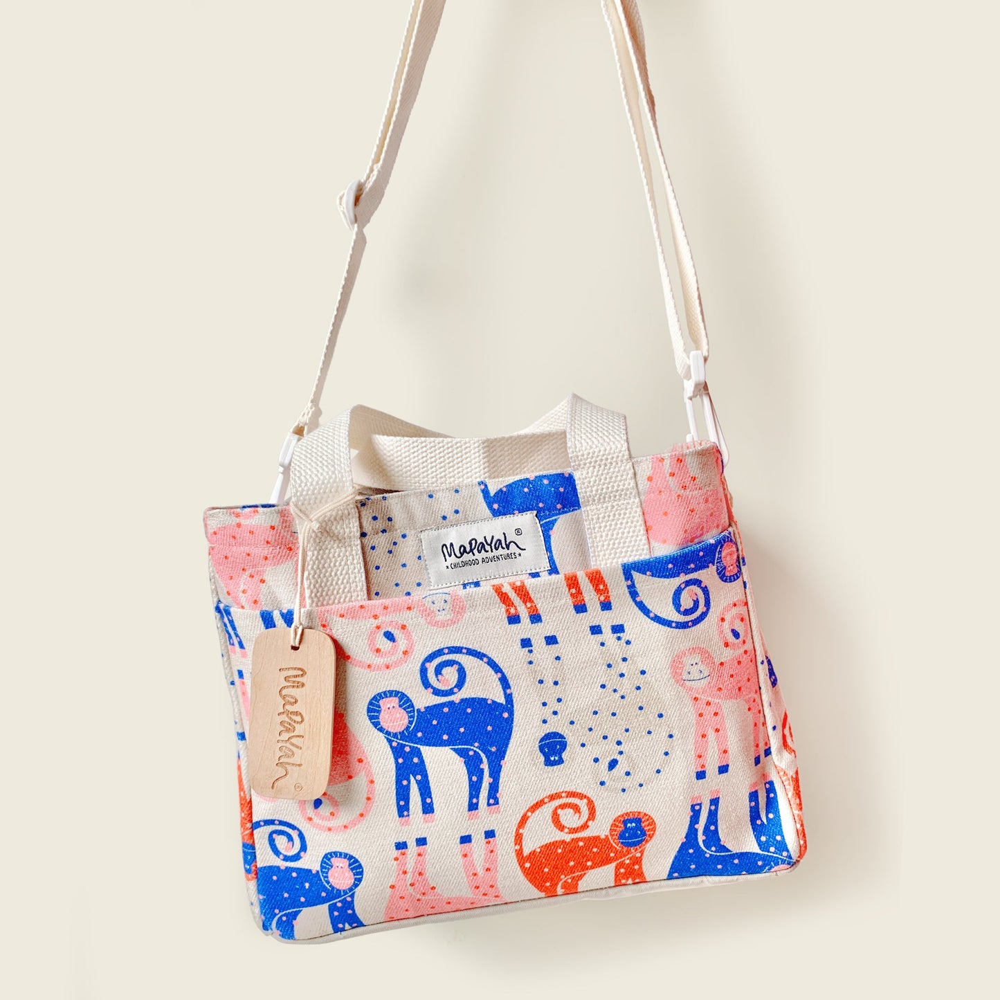 Mapayah PACK Munki kids lunch bag shown hanging by its shoulder strap