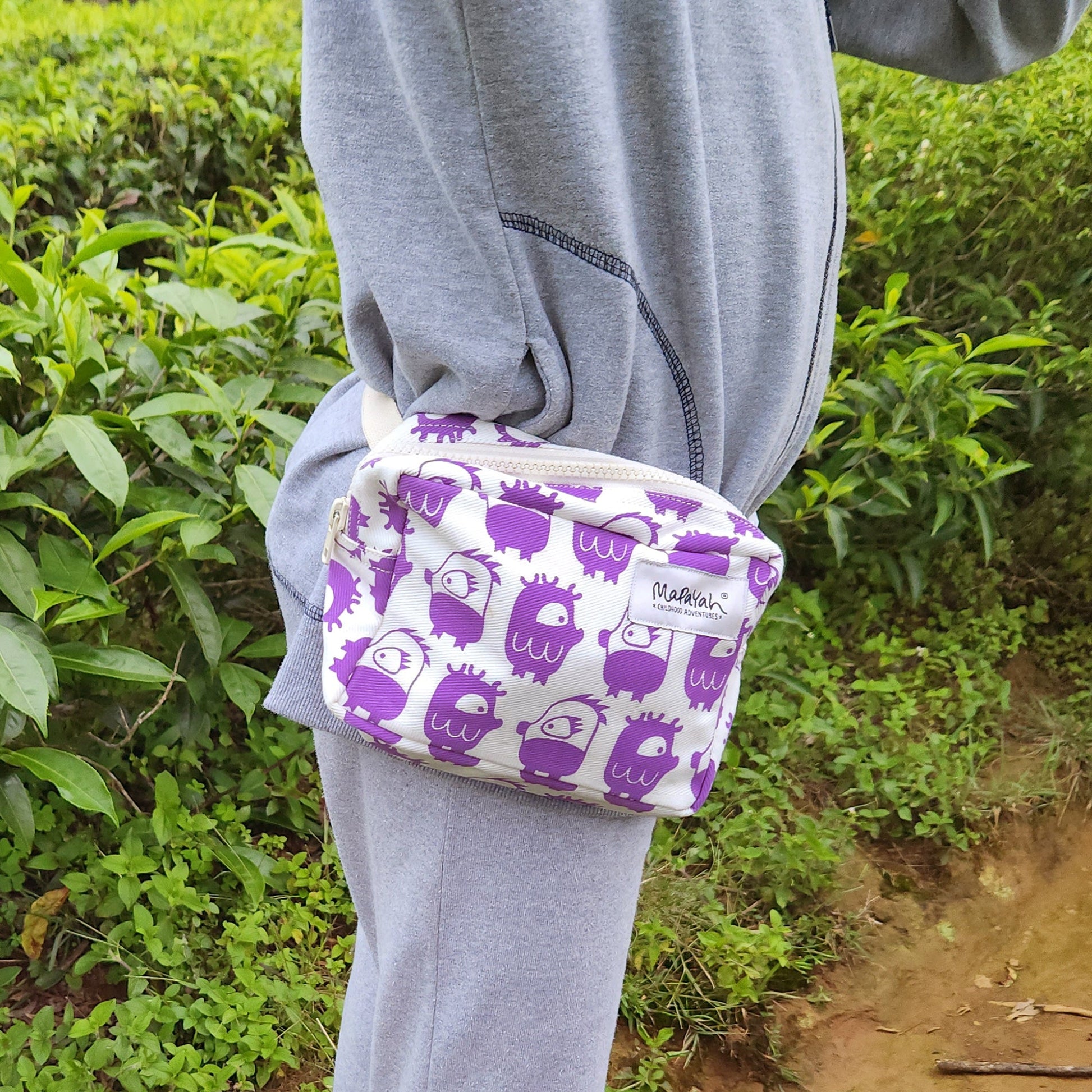 Mapayah POCKET Oddling Purple kids waist bag styled in a lifestyle setting