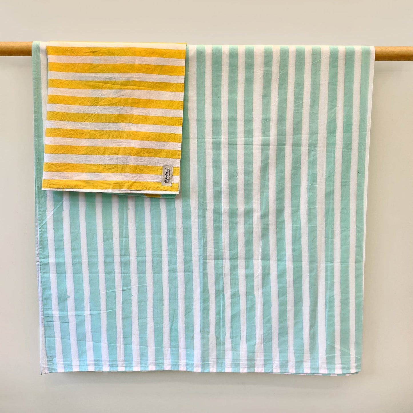 Mapayah SLEEP Bubbles bedsheet and pillow cover shown hanging