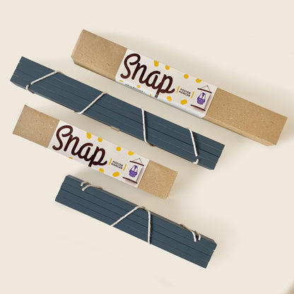 Close-up of Mapayah SNAP A3 and A4 magnetic poster hangers in grey