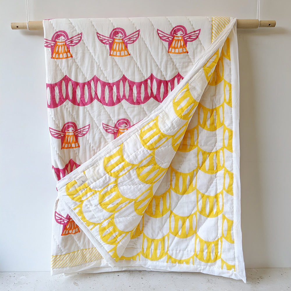 Mapayah SNUGGLE Angela kids blanket shown hanging alongside a folded blanket