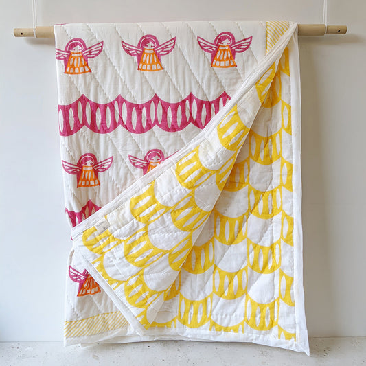 Mapayah SNUGGLE Angela kids blanket shown hanging alongside a folded blanket