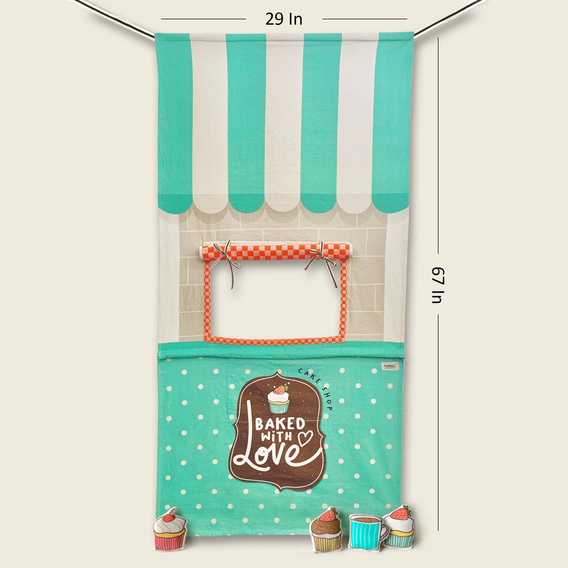 Size and dimensions diagram of the Mapayah Stage Café doorway curtain, measuring 29 x 67 inches, shown with its striped awning, checkered serving window, and stuffed cupcake and mug props.
