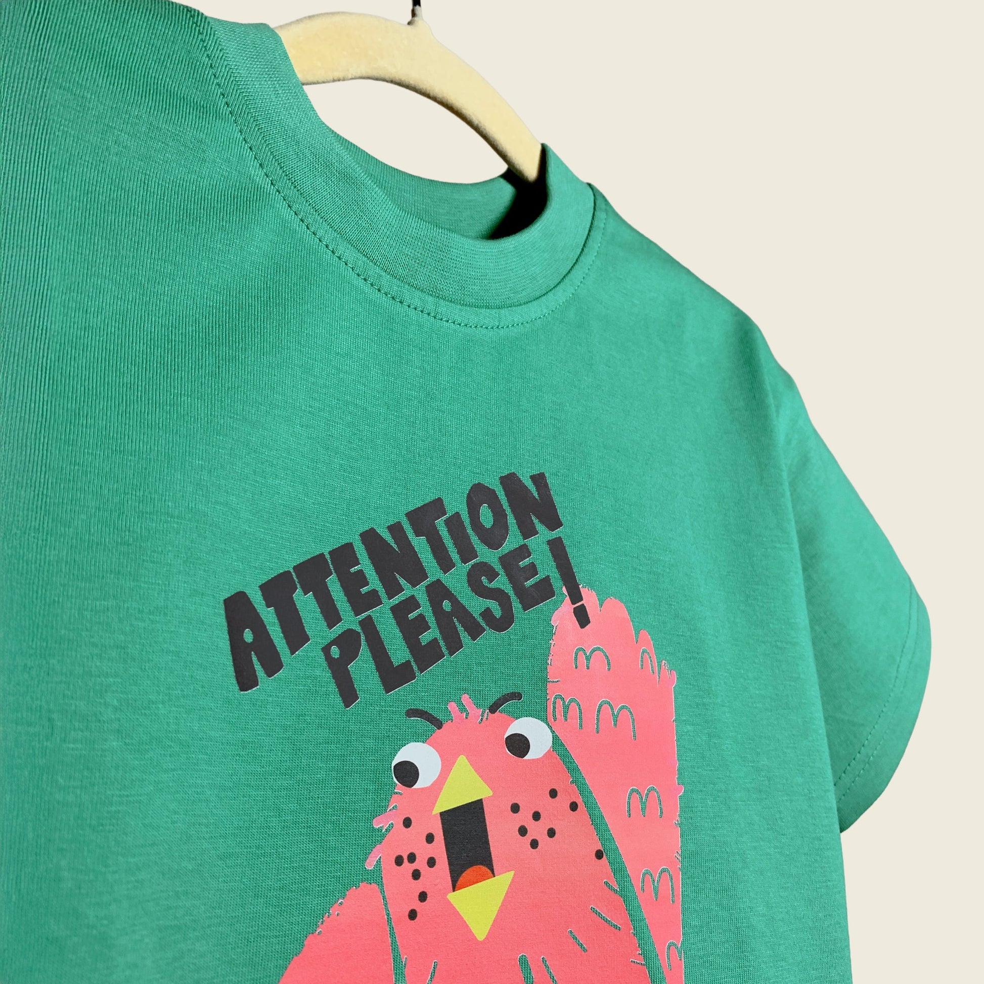 Close-up of Attention Please print on Mapayah kids t-shirt