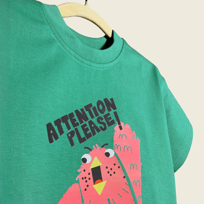 Close-up of Attention Please print on Mapayah kids t-shirt