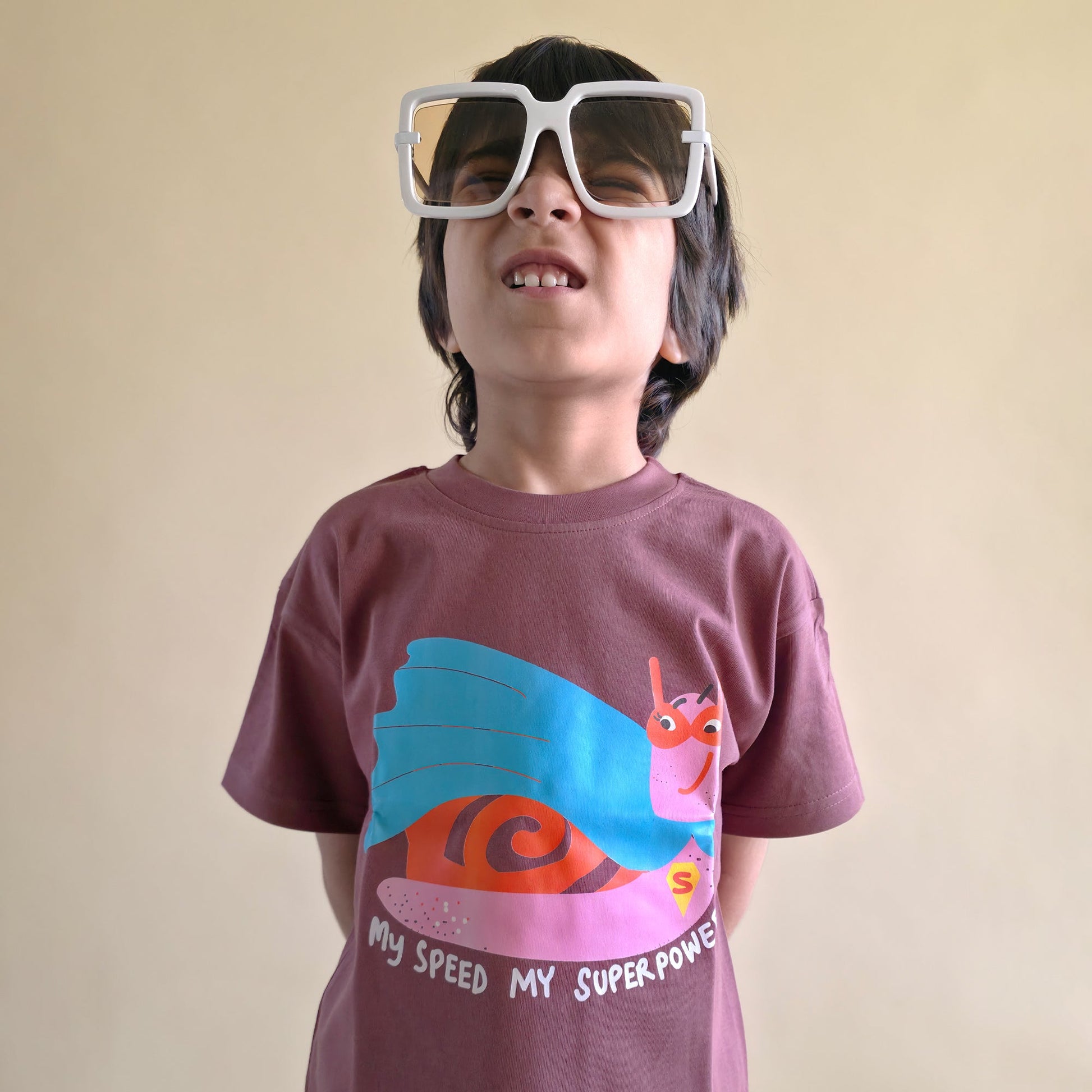 Mapayah My Speed My Superpower kids t-shirt styled in a lifestyle setting