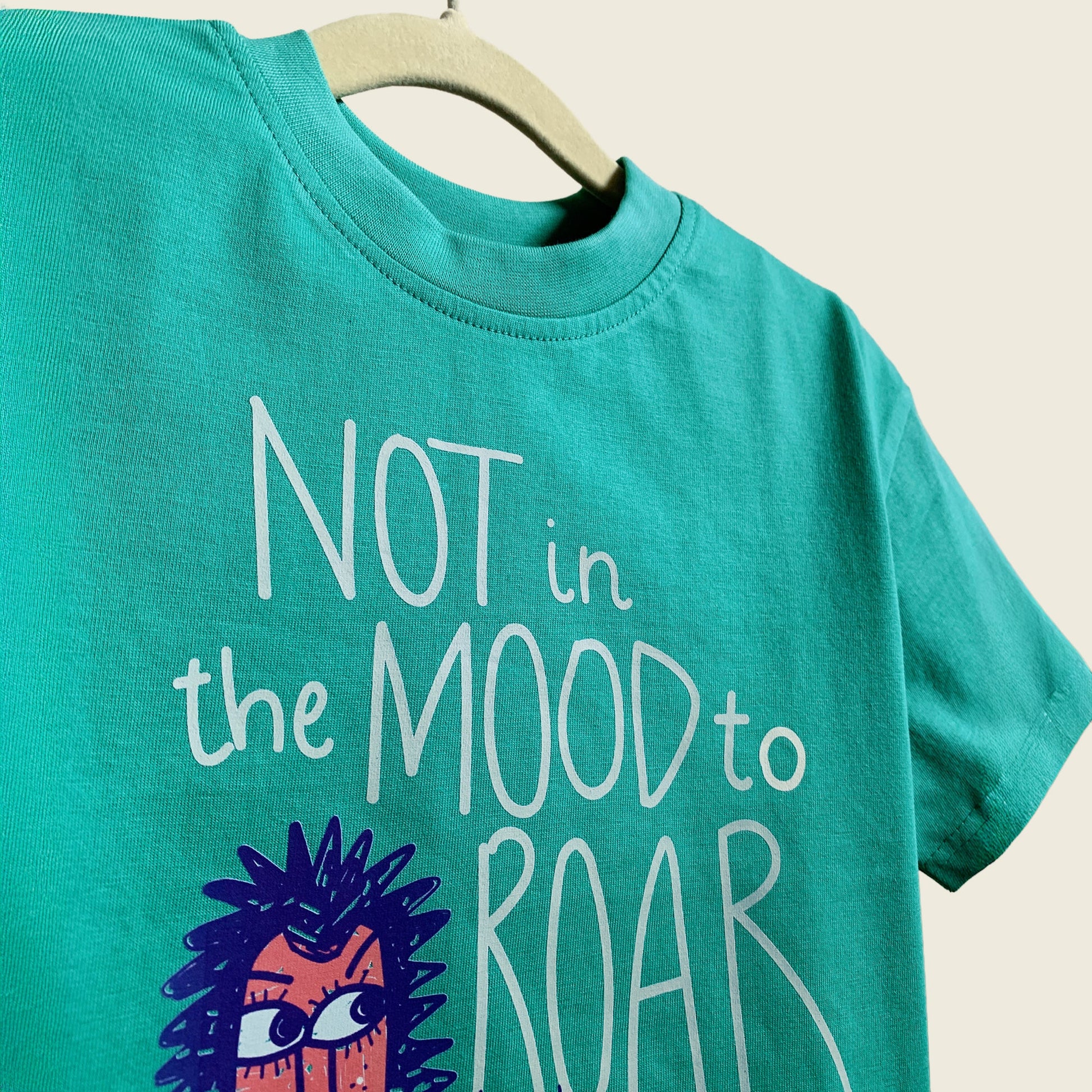 Close-up of Not in the Mood print on Mapayah kids t-shirt