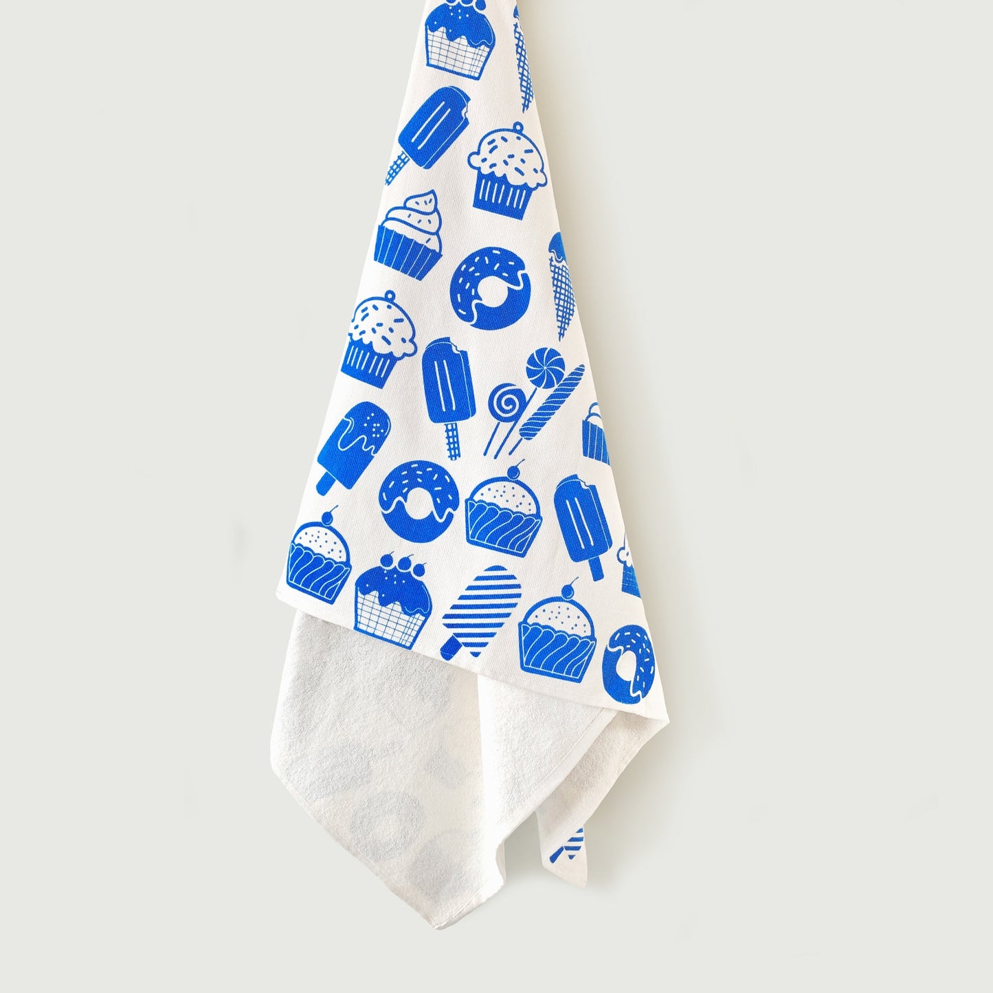 Mapayah WRAP Candy Blue kids bath towel shown hanging