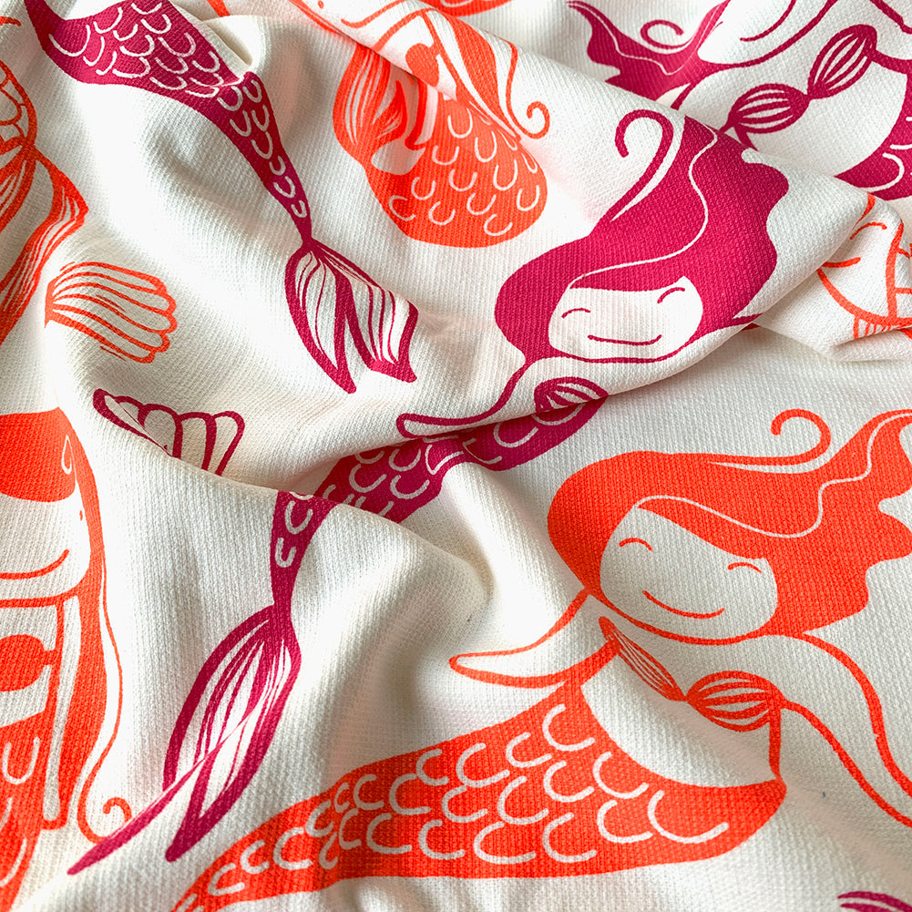 Close-up of Mermaid print on Mapayah WRAP Mermaid Pink/Orange kids bath towel