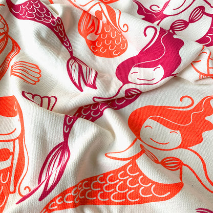 Close-up of Mermaid print on Mapayah WRAP Mermaid Pink/Orange kids bath towel