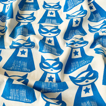 Close-up of Supermeow print on Mapayah WRAP Supermeow Blue kids bath towel