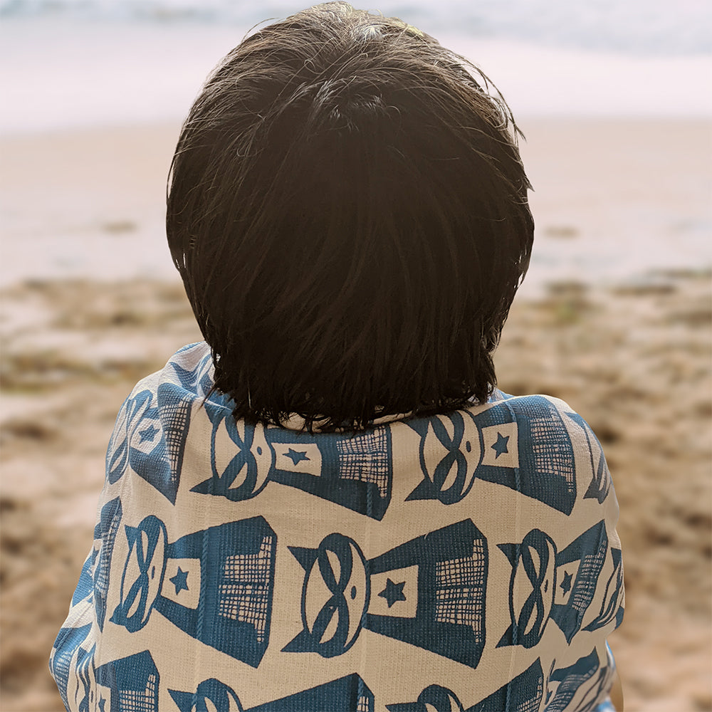 Mapayah WRAP Supermeow Blue kids bath towel styled in a lifestyle setting